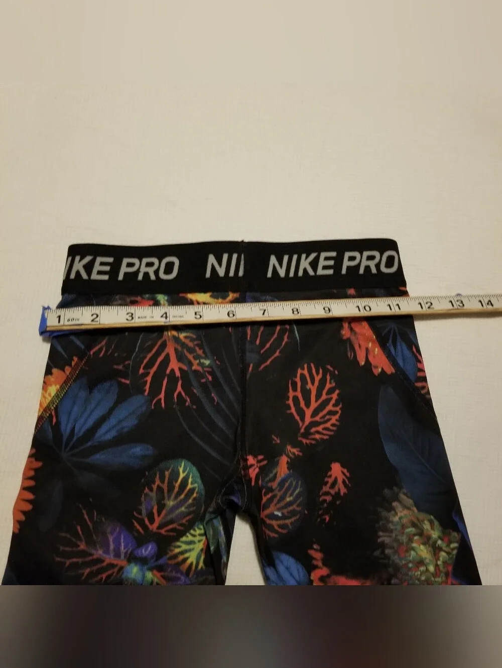 Nike Pro Girl's Small Black With Blue, Orange, & Yellow Floral Print Leggings